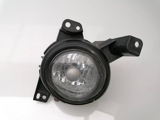 Wspornik mocowania lampy przeciwmgielnej prawej GHR451684A Mazda