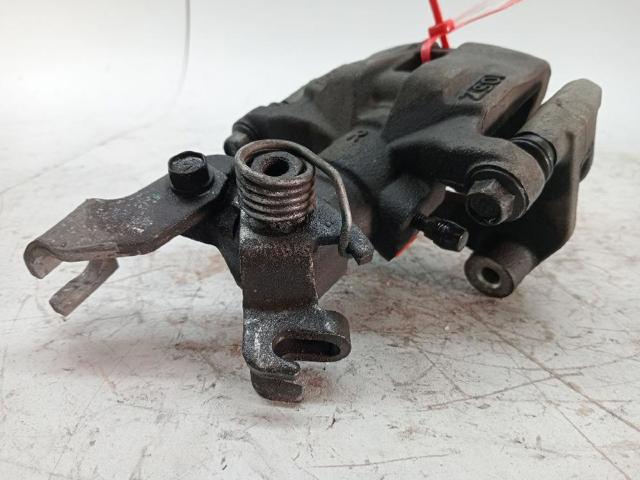 Zacisk hamulcowy tylny prawy GJ6A2661XC MAZDA