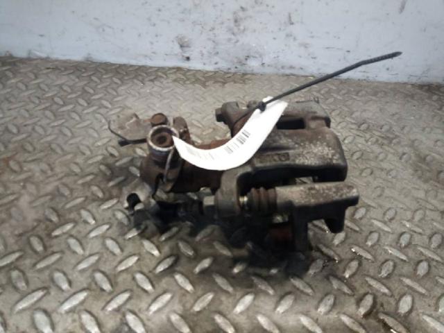 Zacisk hamulcowy tylny prawy GJ6A2661XC MAZDA