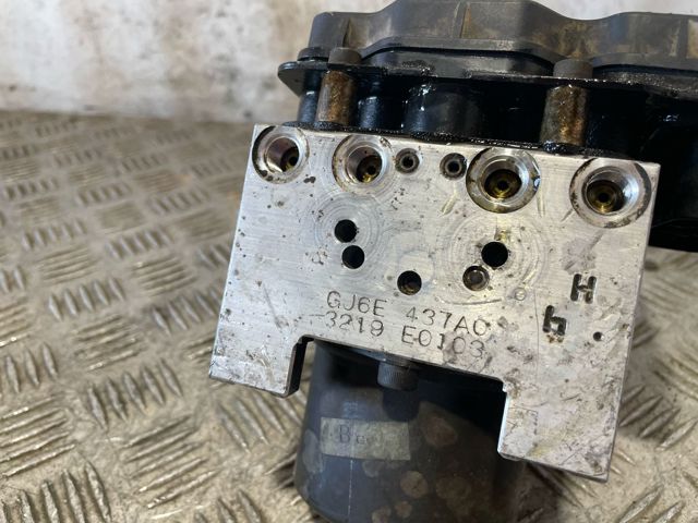 Sterownik ABS  hydrauliczny GJ6E437A0 MAZDA