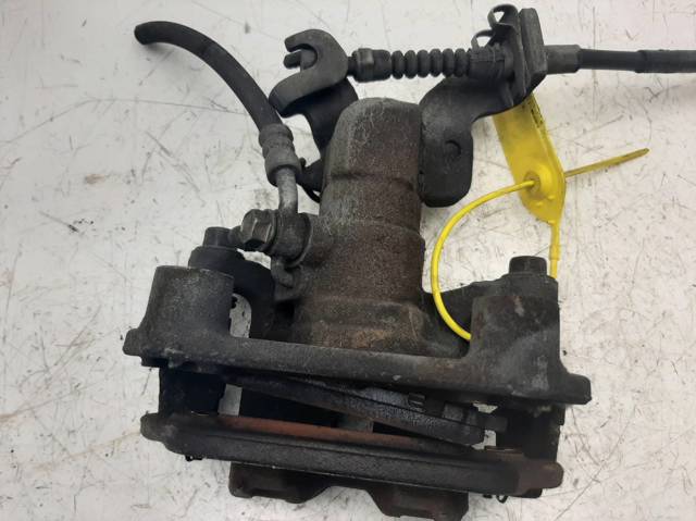 Zacisk hamulcowy tylny lewy GJZA2699ZC MAZDA