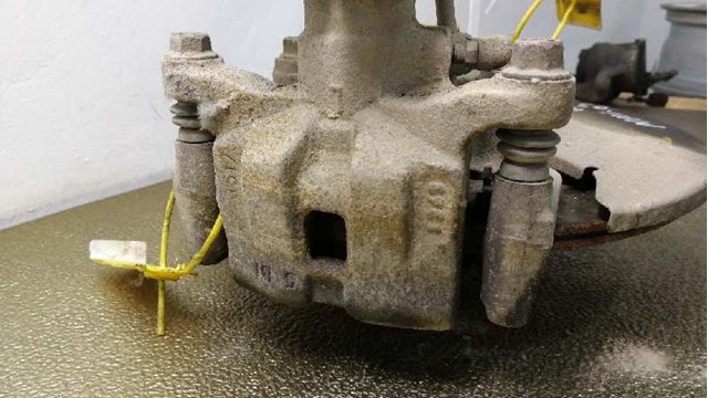 Zacisk hamulcowy tylny lewy GJZA2699ZC MAZDA