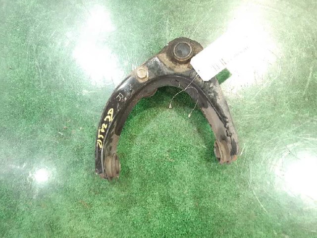 Wahacz zawieszenia przedniego prawy górny GV2W34200 MAZDA