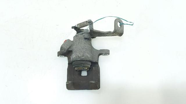 Zacisk hamulcowy tylny lewy K0112671XA MAZDA