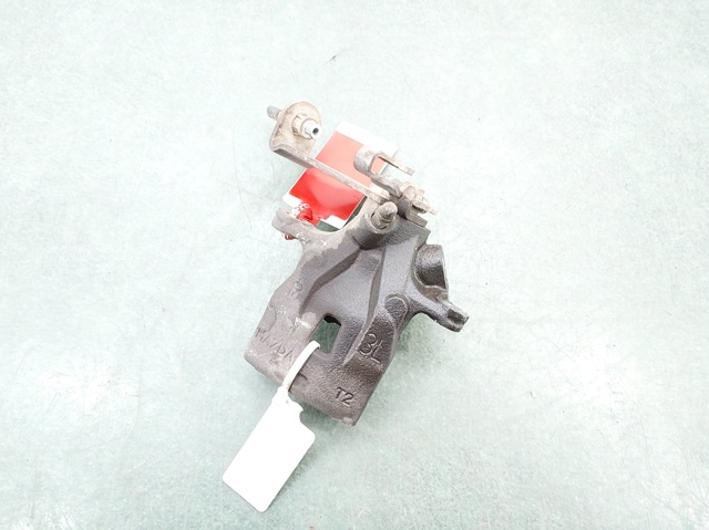 Zacisk hamulcowy tylny lewy K0Y12699ZA MAZDA