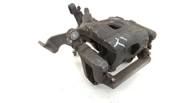Zacisk hamulcowy tylny lewy K0Y12699ZA MAZDA