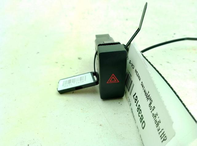 Przycisk włączania światła awaryjnego KD45664H0 MAZDA