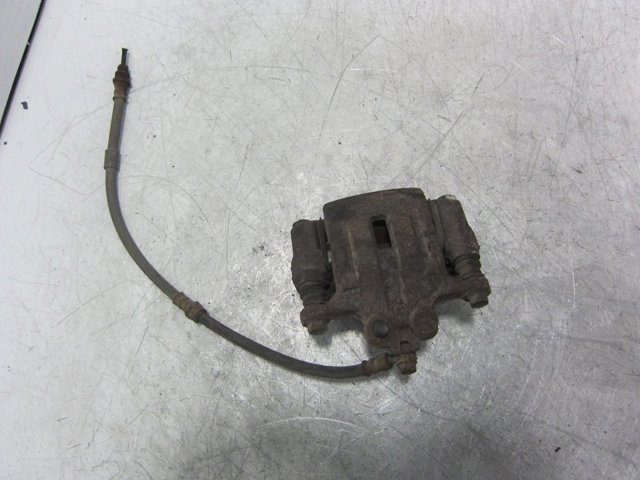 Zacisk hamulcowy tylny prawy L23226980G MAZDA