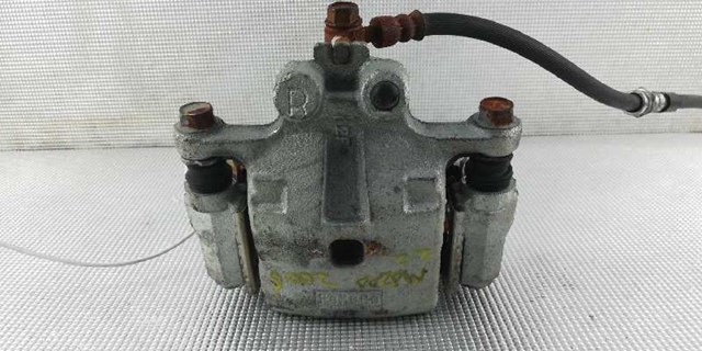 Zacisk hamulcowy tylny prawy L23226980G MAZDA