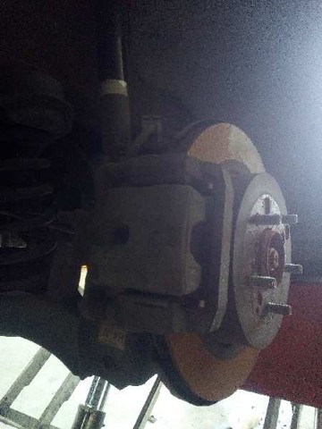 Zacisk hamulcowy tylny prawy L23226980H MAZDA