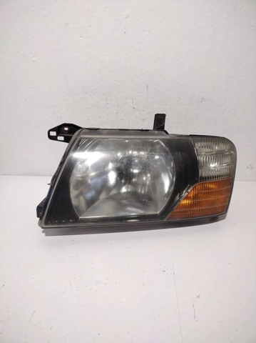 Reflektor lewy MN133751 MITSUBISHI