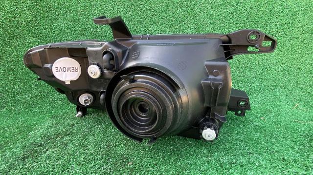 Reflektor lewy MN133751 MITSUBISHI