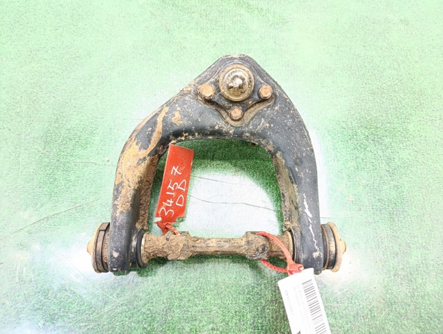 Wahacz zawieszenia przedniego prawy górny MR124880 MITSUBISHI