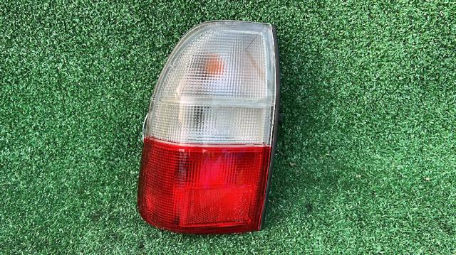 Lampa zespolona tylna lewa do Mitsubishi L 200 K60, K70