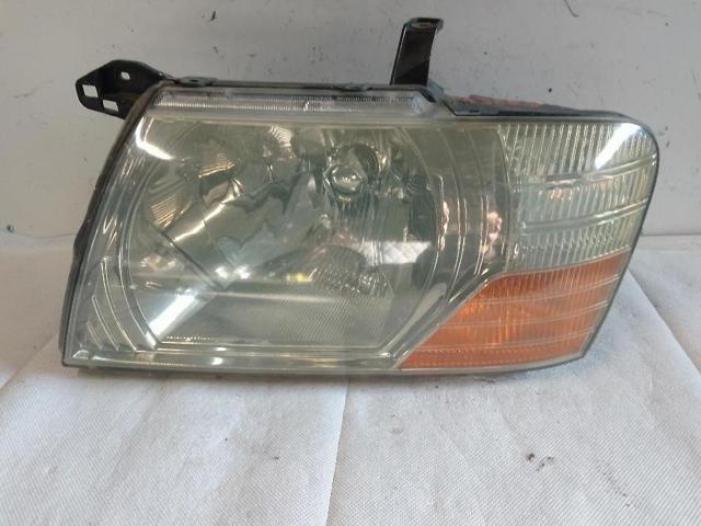 Reflektor lewy MR558823 MITSUBISHI