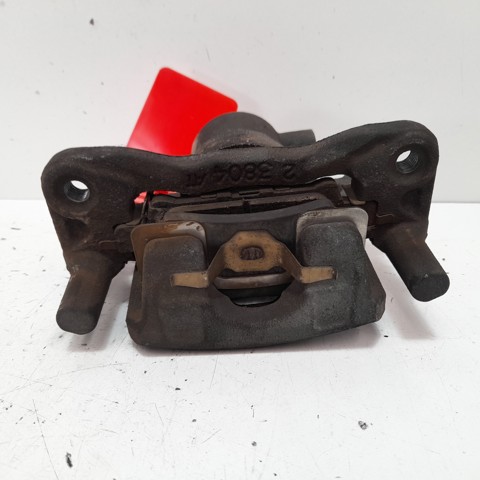 Zacisk hamulcowy tylny lewy MR955065 MITSUBISHI