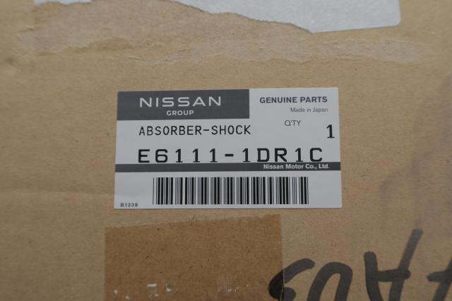 Do koszyka E61111DR1C Nissan/Infiniti Amortyzator przedni lewy