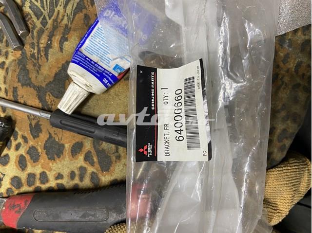 6400G660 Mitsubishi Wspornik zderzaka przedniego prawy