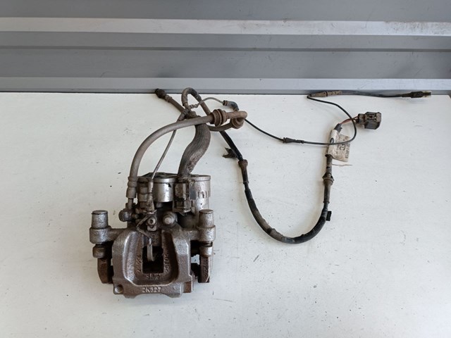 Zacisk hamulcowy tylny prawy Land Rover LR061380