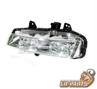 LR026090 Land Rover Lampa przeciwmgielna lewa