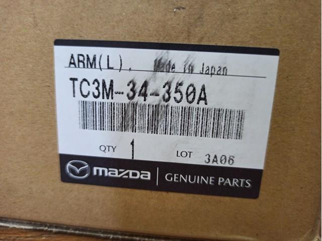 Do koszyka Wahacz zawieszenia przedniego dolny lewy Mazda CX-9  TC