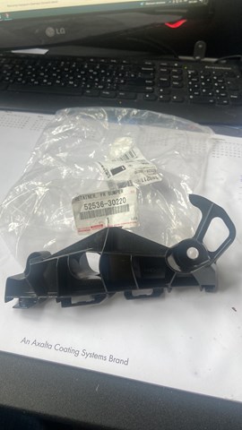 5253630220 Toyota Wspornik zderzaka przedniego lewy