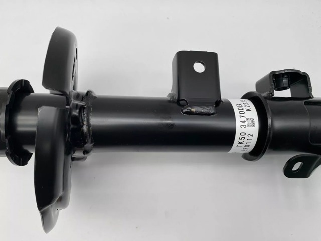 Amortyzator przedni prawy TK5034700B Mazda