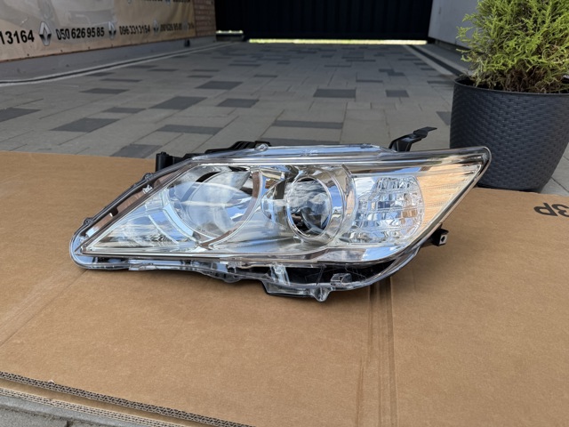 81E2090E Polcar Reflektor lewy