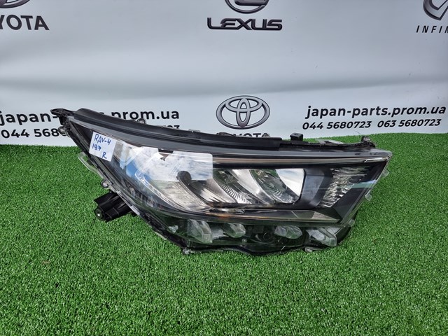 8114542840 Toyota reflektor prawy