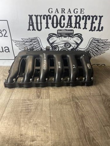 Kolektor ssący do BMW 7  E38