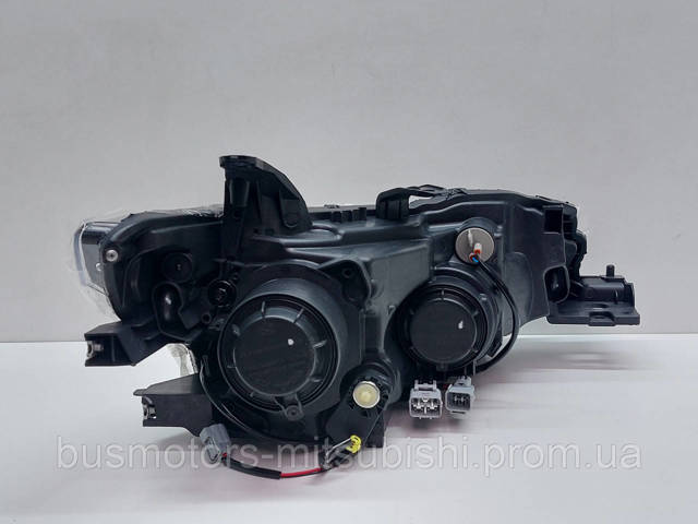 Do koszyka 8301C203 Mitsubishi Reflektor lewy