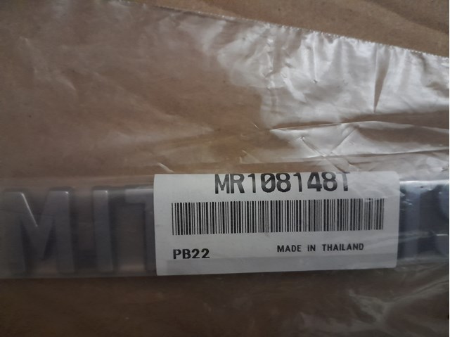 Emblemat na klapę bagaznika (znaczek firmowy) do Mitsubishi Lancer VI CJ, CP