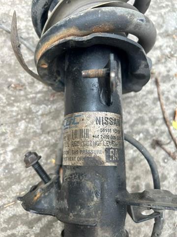 E61101CF0F Nissan/Infiniti Amortyzator przedni prawy