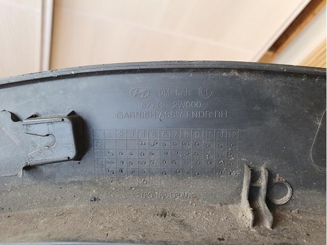 Do koszyka 877122W000CA Hyundai/Kia Poszerzenie (nakładka) reperaturki błotnika przedniego prawy