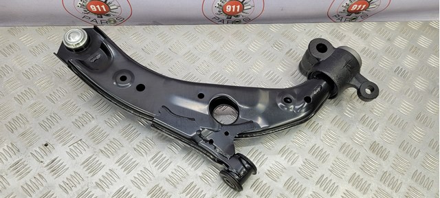 Do koszyka TC3M34350A Mazda Wahacz zawieszenia przedniego dolny lewy