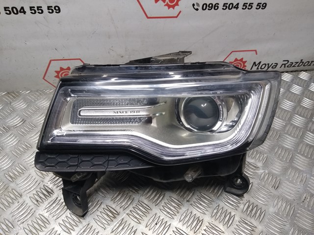 Reflektor lewy Chrysler 68144709AF cena, od 439,08 USD