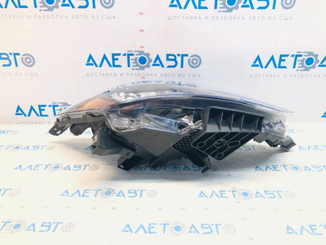 Reflektor prawy 209983001N TYC