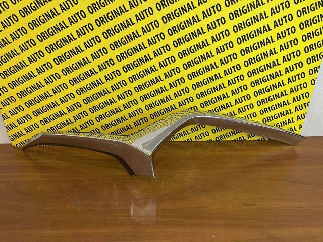 Listwa ochronna atrapy chłodnicy lewa Mazda DGH9507K0B
