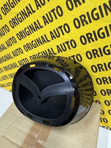 Uchwyt emblematu kratki chłodnicy GBFN50716 Mazda