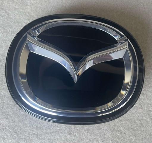Emblemat na atrapę chłodnicy Mazda BERC51730 cena, od 246,28 USD