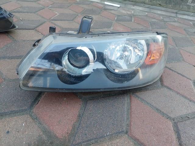 Reflektor lewy 26060BN67A Nissan/Infiniti