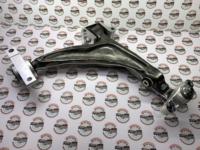 32381879 Volvo Wahacz zawieszenia przedniego dolny lewy