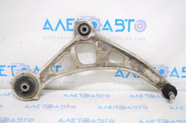 Do koszyka 545005AA0B Nissan/Infiniti Wahacz zawieszenia przedniego dolny prawy