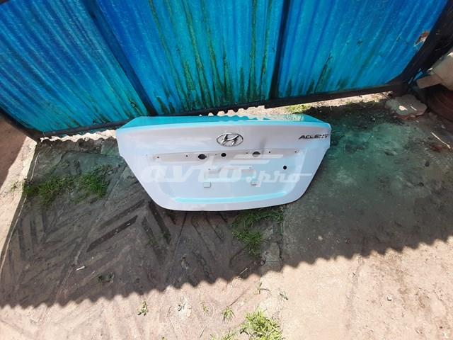 Do koszyka Klapa bagażnika Hyundai Accent IV SB