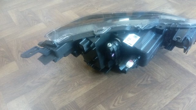 Do koszyka 811500DP50 Toyota Reflektor lewy