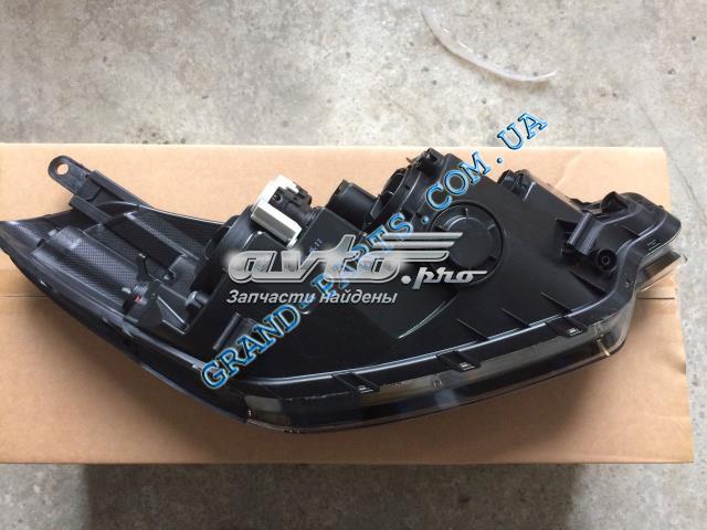 20E334052B TYC Reflektor lewy