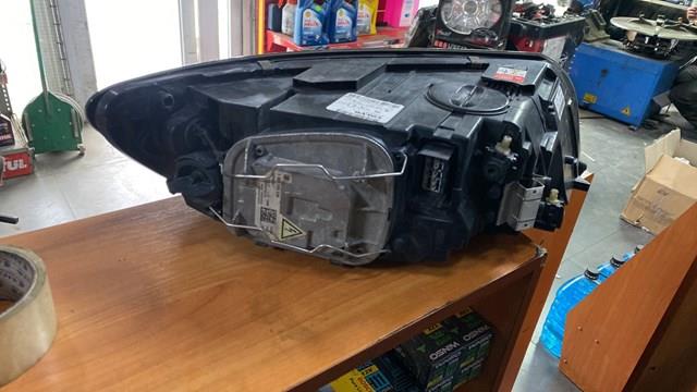 Reflektor lewy 31299585 Volvo