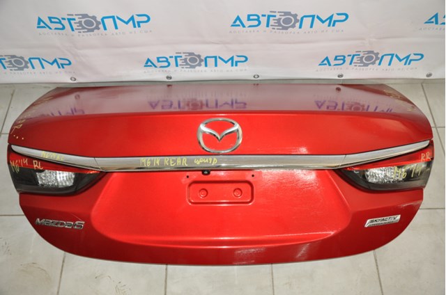 Do koszyka GJY15261X Mazda Klapa bagażnika