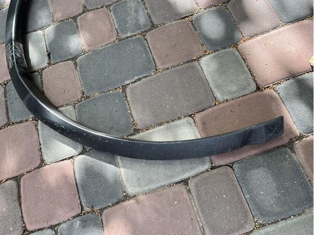 Do koszyka 768535AA0A Nissan/Infiniti Poszerzenie (nakładka) reperaturki błotnika przedniego lewy