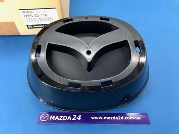 Uchwyt emblematu kratki chłodnicy Mazda GBFN50716 cena, od 49,00 USD